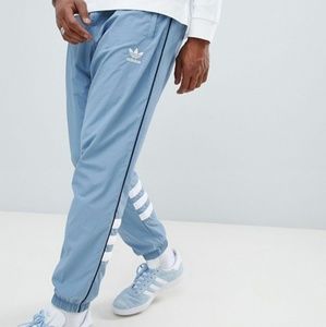 Men's adidas track pants jogger in Raw Grey Blue
